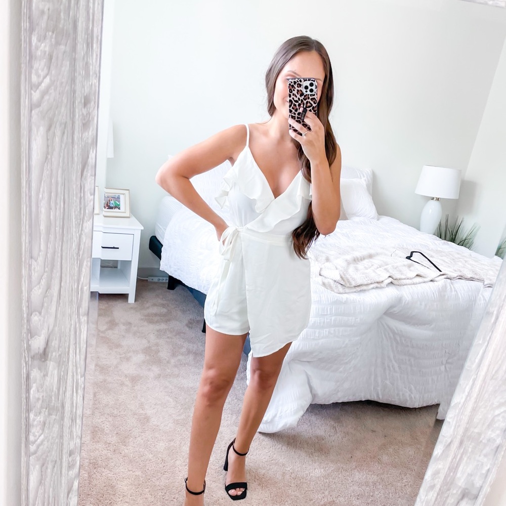 White envelope romper size S